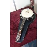 Vintage Good quality Banjo Ukulele in fitted case with spares strings and Tuner.