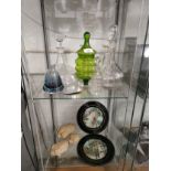 Shelf of glass decanters together with shelf plaques etc .