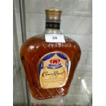 Bottle of Royal fine De Luxe whisky 1 litre full and sealed .