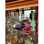 Shelf of art glass wares includes Murano .