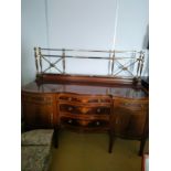 Large Georgian buffet side board with brass gallery backing fitted with a cooler compartment.
