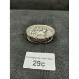 Decorative 800 grade silver pill box with victorian scene to top . 21 grams .