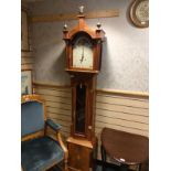 Large Grandfather clock with brass eagle to top with pendulum weight s key etc .