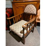 1900s oak reclining chair with lovely upholstery.