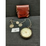 Silver hall marked pocket watch , with Albert chain with collection of 3 early silver coins .