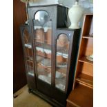 Antique Display cabinet on pedistal stand .