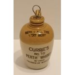 Rare curries no 10 miniature whisky flagon with original stopper . 5 inches in height .