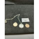 Irish silver medallion Dublin dated 1955 on chain together with 2 others .
