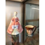 Royal doulton figure Debbie together with small royal doulton toby jug .