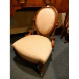 Antique 1900s parlour chair .