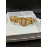 Beautiful vintage 3 setting cameo bracelet .