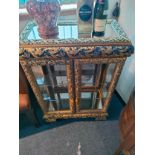 Chinwazorie themed highly decorative china cabinet .
