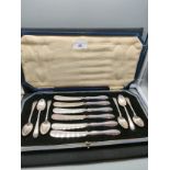 Impressive silver hall marked spoons and knife cutlery set in fitted case .