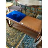 Mid century teak telephone table with blue upholstery.