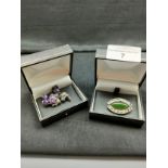 Silver 925 flower and maracite brooch with purple stone setting together with unmarked silver brooch