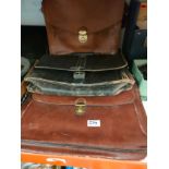 Lot of leather satchels .