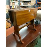 Antique drop leaf Sutherland style table.