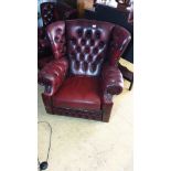 Large Impressive Chesterfield Chair in oxblood leather.