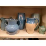 Shelf of early Buchan pottery ware .