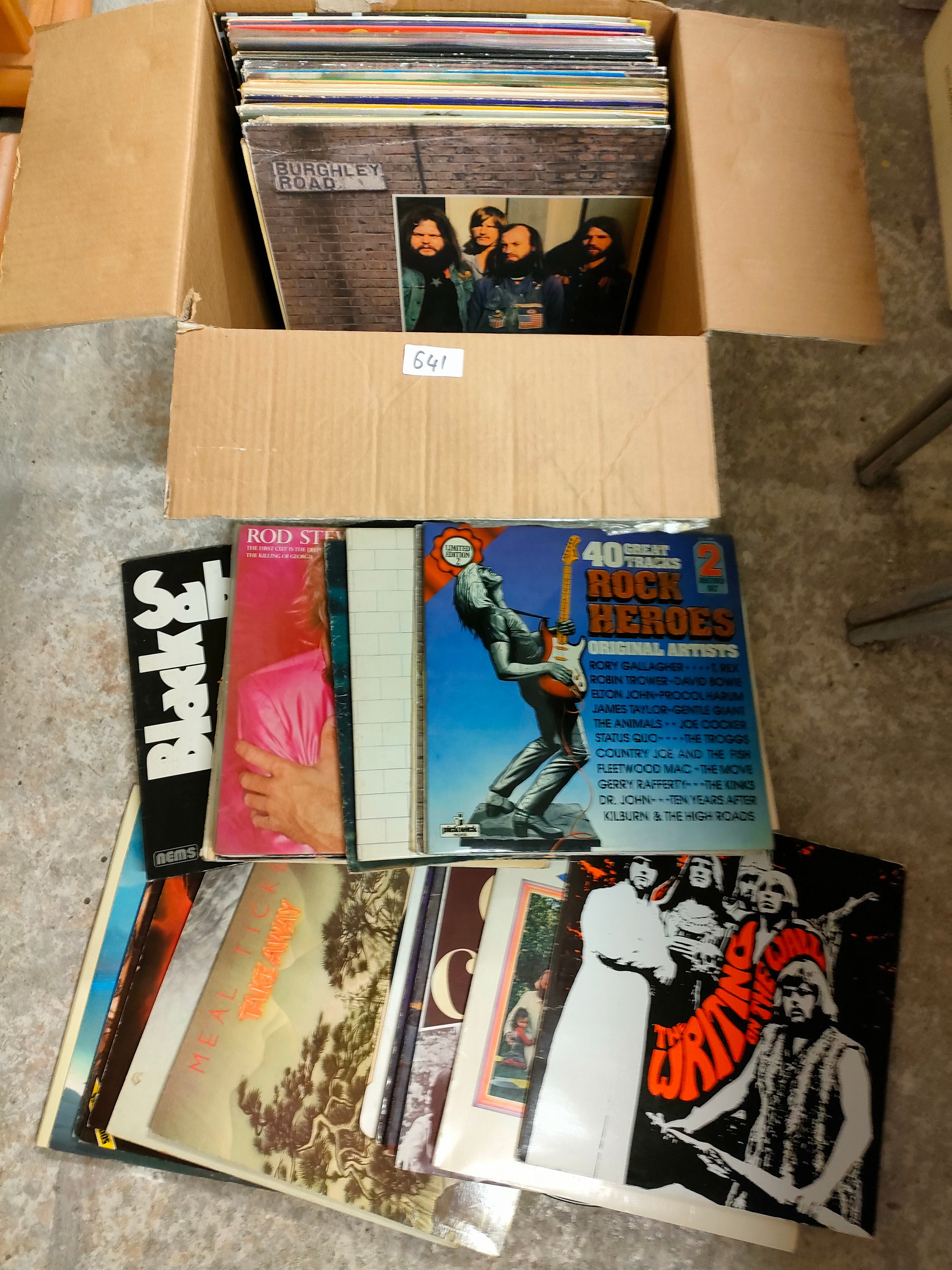 Box of records includes Fleetwood Mac , rod Stewart etc .