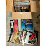 Box of records includes Fleetwood Mac , rod Stewart etc .