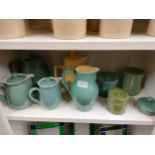 Shelf of retro Denby ware etc .