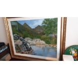 Large oil painting depicting Highland scene fitted in a large gilt frame .