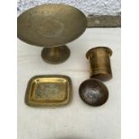 Selection of antique Islamic brass items.