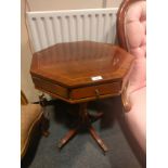 Reproduction hexagonal topped table with drawer front .