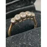 18ct gold 5 stone diamond ring . Tested . Has inclusions .