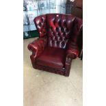 Large Impressive Chesterfield Chair in oxblood leather.