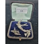 Beautiful marqusite set consisting of a swallow bird brooch with matching earrings in original box .