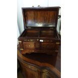 Solid wood and brass inlaid treasure chest stunning piece .