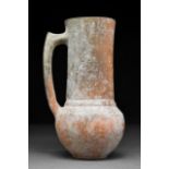 A CYPRIOT BURNISHED POTTERY TANKARD