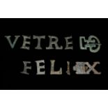 A ROMAN SET OF SILVER MILITARY BELT LETTERS FOR SAYING FELIX VETRE