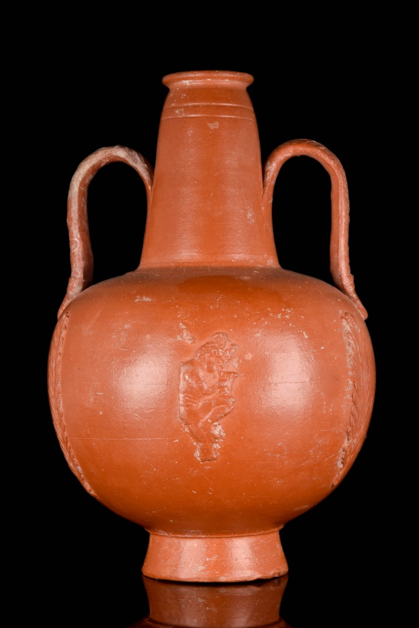 A ROMAN NORTH AFRICAN SLIPWARE AMPHORISKOS