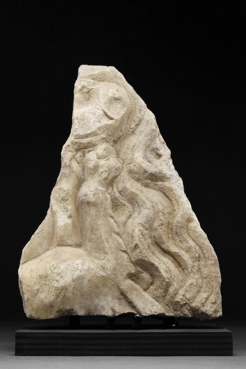 A ROMAN MARBLE FRAGMENT OF FOREPART OF A CAPRICORN