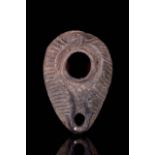 A ROMAN POTTERY OIL LAMP