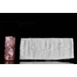 NEO-ASSYRIAN OR NEO-BABYLONIAN CARNELIAN CYLINDER SEAL