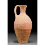 AN EARLY ABYDOS WARE WINE JUG