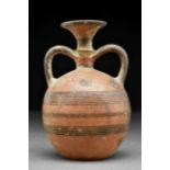 A CYPRIOT BARREL-SHAPED FLASK