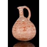 A CYPRIOT RED POLISHED WARE FEEDER BOTTLE