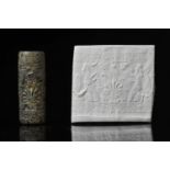 NEO-ASSYRIAN CYLINDER SEAL WITH WORSHIP SCENE