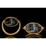 GRECO-PHOENICIAN GOLD RING WITH PEGASUS ONYX INTAGLIO