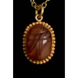 EGYPTIAN CARNELIAN SCARAB IN GOLD PENDANT