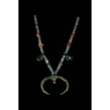 BRONZE AGE CARNELIAN AND BRONZE AMULET NECKLACE