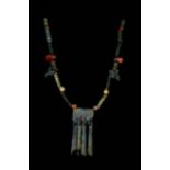 BRONZE AGE NECKLACE WITH AMULETS