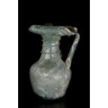 ROMAN GLASS JUG WITH HANDLE AND TRAIL