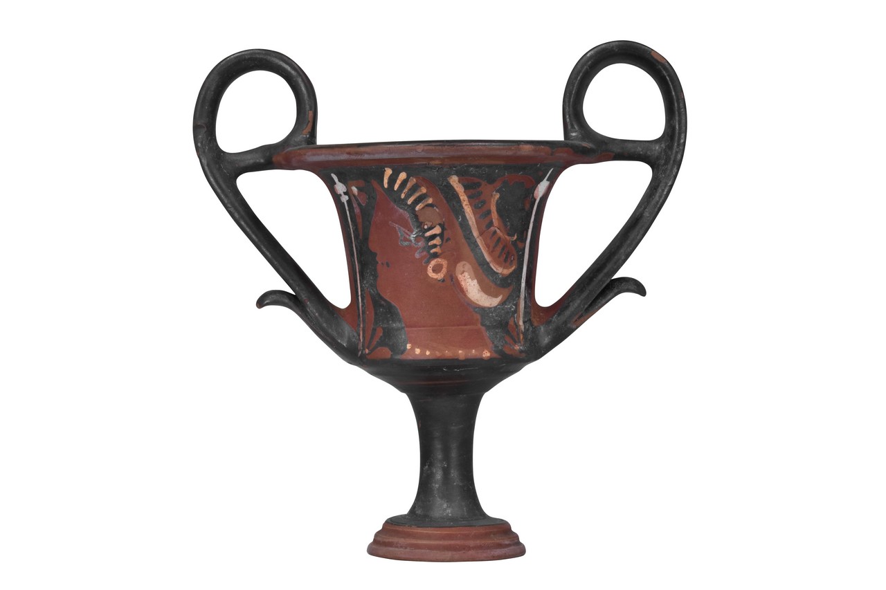 RARE APULIAN RED-FIGURE KANTHAROS WITH FEMALE HEADS