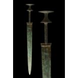 ANCIENT BRONZE SWORD WITH ELABORATE HANDLE